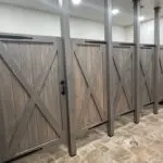 A long shot of the five wooden doors