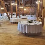 Decorated dining tables at a wedding