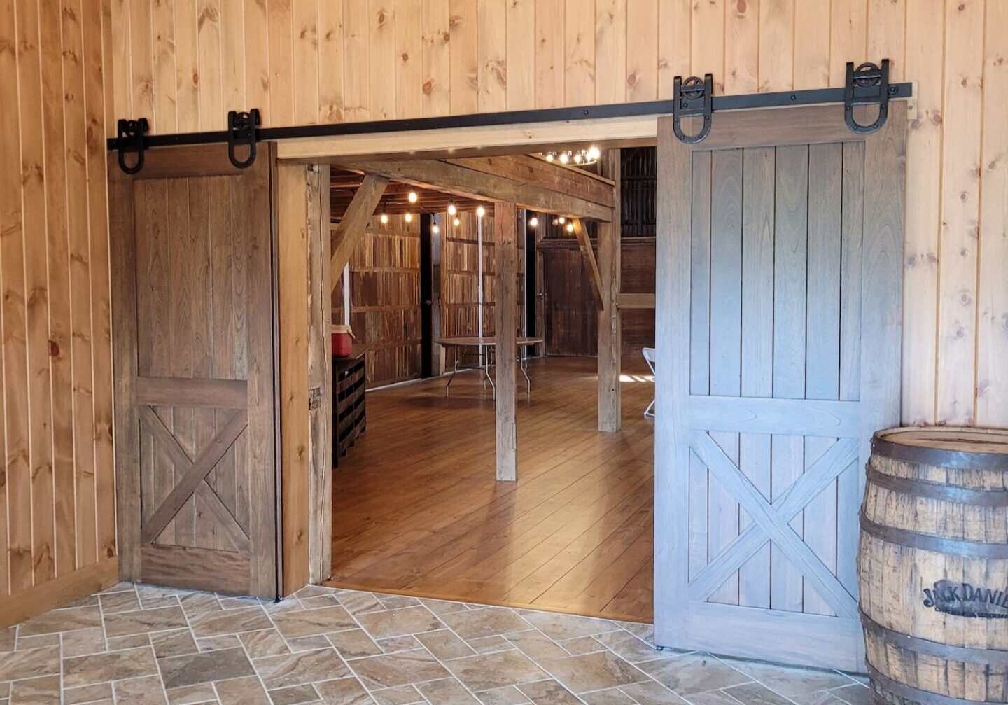 There are two double doors leading into the Barn